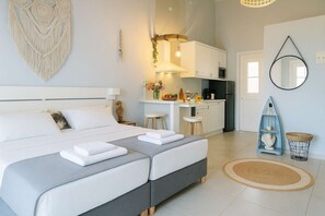 Modern and cozy bedroom with twi single beds that can be joined together and form a double one
