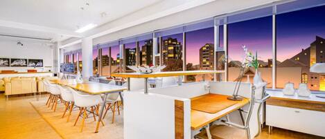 Wake up to breathtaking city views in this modern oasis.