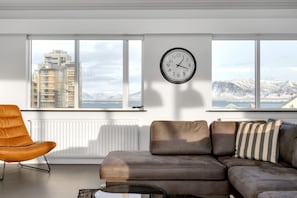 Spectacular vistas await in this apartment oasis: behold breathtaking mountain ocean views and captivating Reykjavík cityscapes