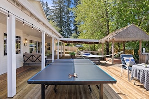 Huge deck offers sun, shade, tables seating 16+ and Ping Pong!