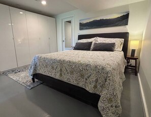 Queen bed with firm memory foam mattress and full zippered encasements