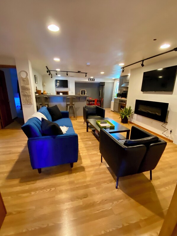 Welcome to The Landing.  Large screen TV and electric fireplace.