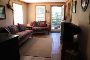 living room. looking outside - farm dog Jake patiently waiting 