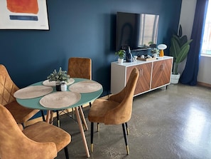 The dining area encourages you to gather with friends, enjoy a drink, and create lasting memories.