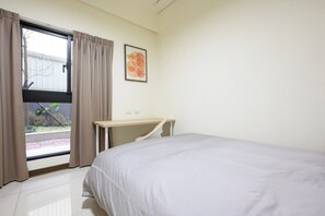 bed room with big window