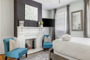 Warm wood tones and pops of blue create a charming, functional space for your daily needs.