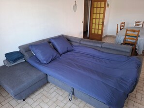 couchage supplémentaire dans le salon