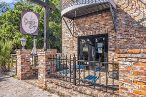 Front entry lower level is a boutique coffee shop. 