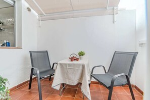 Private Courtyard just off the bedroom — a Peaceful Spot for Morning Coffee or a Quiet Evening Chat.
