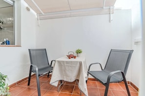 Private Courtyard just off the bedroom — a Peaceful Spot for Morning Coffee or a Quiet Evening Chat.