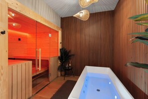A private sauna and cold plunge wellness area for community residents 