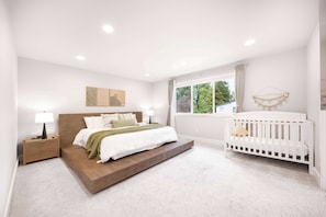 Here is the master bedroom with king size bed and a baby crib!