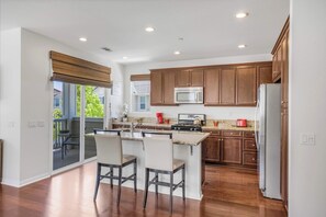 Fully equipped kitchen with stainless steel appliances