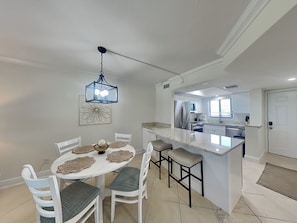 Dining Area with Seating for Four + Breakfast Bar with Seating for Two