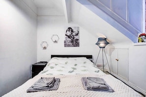 Bedroom with ample towels