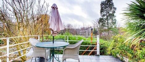 Balcony with garden views