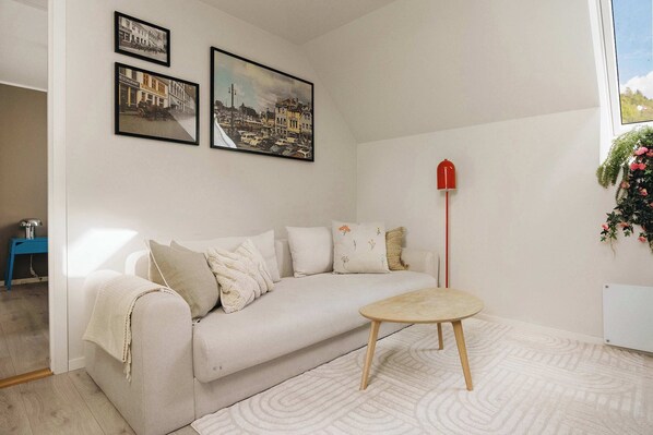 Bright and inviting layout for relaxing or enjoying meals together.