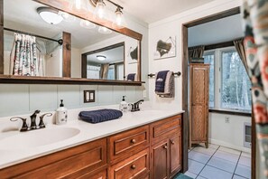 2 basin bathroom with shower/tub, stocked with essentials