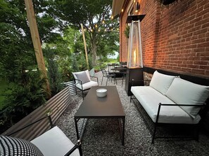 Patio seating area, with heater