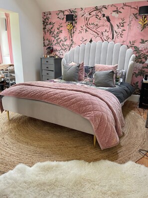 Luxurious master suite with Anthropolgie king size bed and spa like en suite