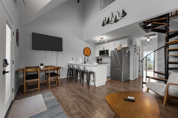 Modern style meets functional living in this airy open floor plan.