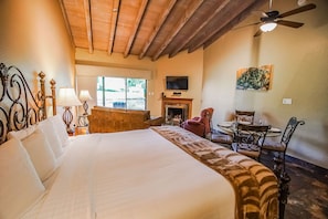 Unwind in a cozy interior with a gas fireplace and inviting furnishings, offering a perfect escape for couples in Sedona's beautiful surroundings.