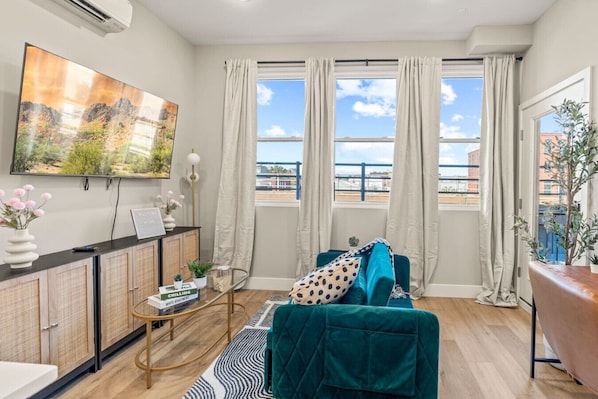 Relax in the living room and watch your favorite shows, lounging is a great way to unwind after a long day.