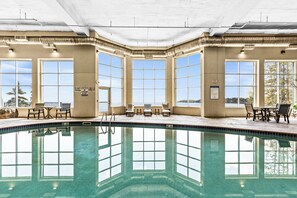 Family-friendly pool with lake views and cozy vibes