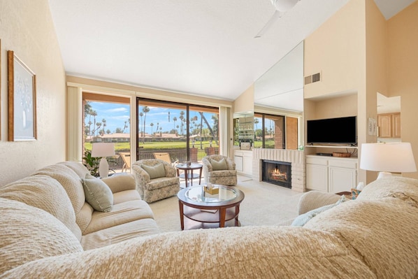 Comfortable living room featuring a Fireplace and TV for Relaxation