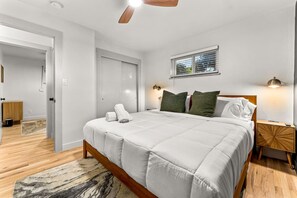 Sleep like royalty in the primary bedroom with king bed