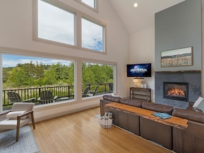 Living room with gas fireplace and Smart tv