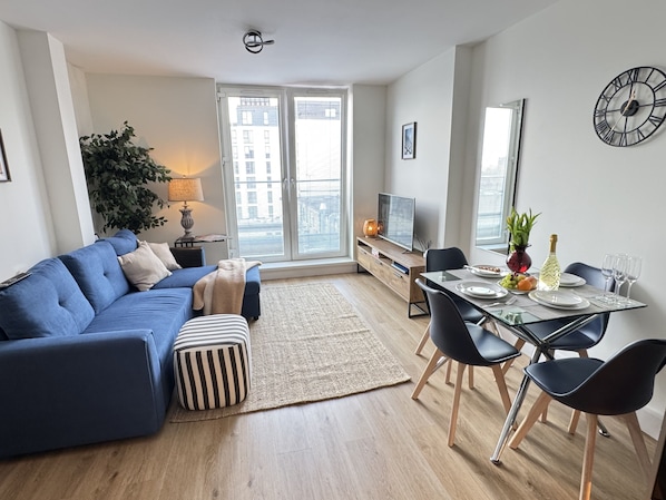 Living room with a Dining area