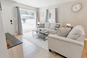 Living room, overlooks the front yard with beautiful natural light