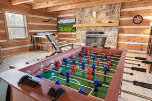 Game on! Challenge your friends/family to a foosball match.