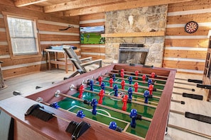 Game on! Challenge your friends/family to a foosball match.