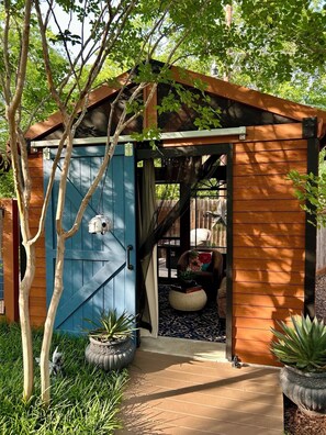 Your fully enclosed gazebo with TV - Amazon Prime and Netflix.  Ceiling Fan.