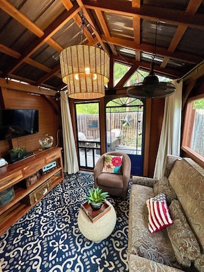 Gazebo interior, fully enclosed with attached private deck.
