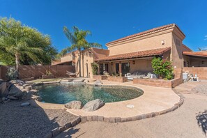 Your private resort-style backyard featuring pool and spa.
