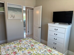 Bedroom 2 with king bed and sheets 