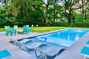 The pool has a tanning ledge with two bubblers and three pool loungers. The shallow tanning ledge is perfect for reading a book or for little ones to play.