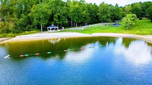 Enjoy access to community swimming pool, tennis courts, pickle ball, beach, and playground.