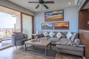 Spacious living room that opens to the large private balcony