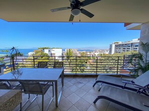 The private balcony overlooks downtown Puerto Vallarta and Banderas Bay
