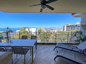 The private balcony overlooks downtown Puerto Vallarta and Banderas Bay
