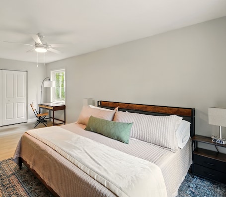 King-size bed with plush linens for restful nights