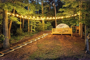 Our glowing geodome is a magical space to lounge, read, or stargaze.
