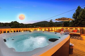 Relax in the oversized hot tub with panoramic views of the Blue Ridge Mountains