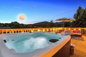Relax in the oversized hot tub with panoramic views of the Blue Ridge Mountains