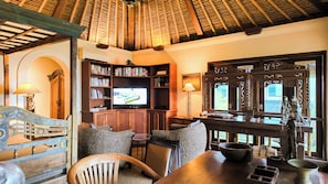 Tylish study space with a sleek desk, bookshelves, and soft natural lighting