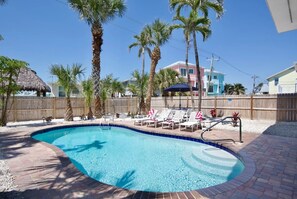 Plenty of lounge chairs to soak up the sun poolside